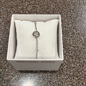 Michael Kors Silver-Tone Crystal Accent Logo Disc Bracelet